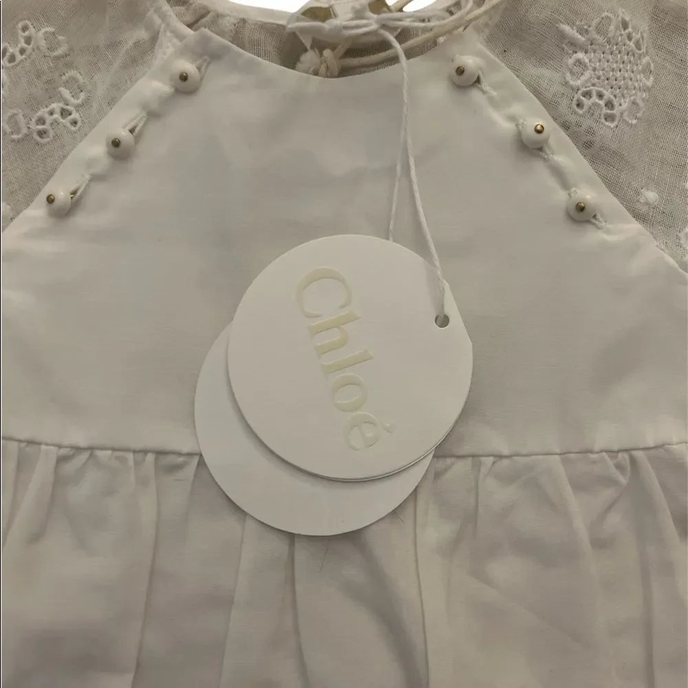 Chloé white lined eyelet dress lots of unique detail